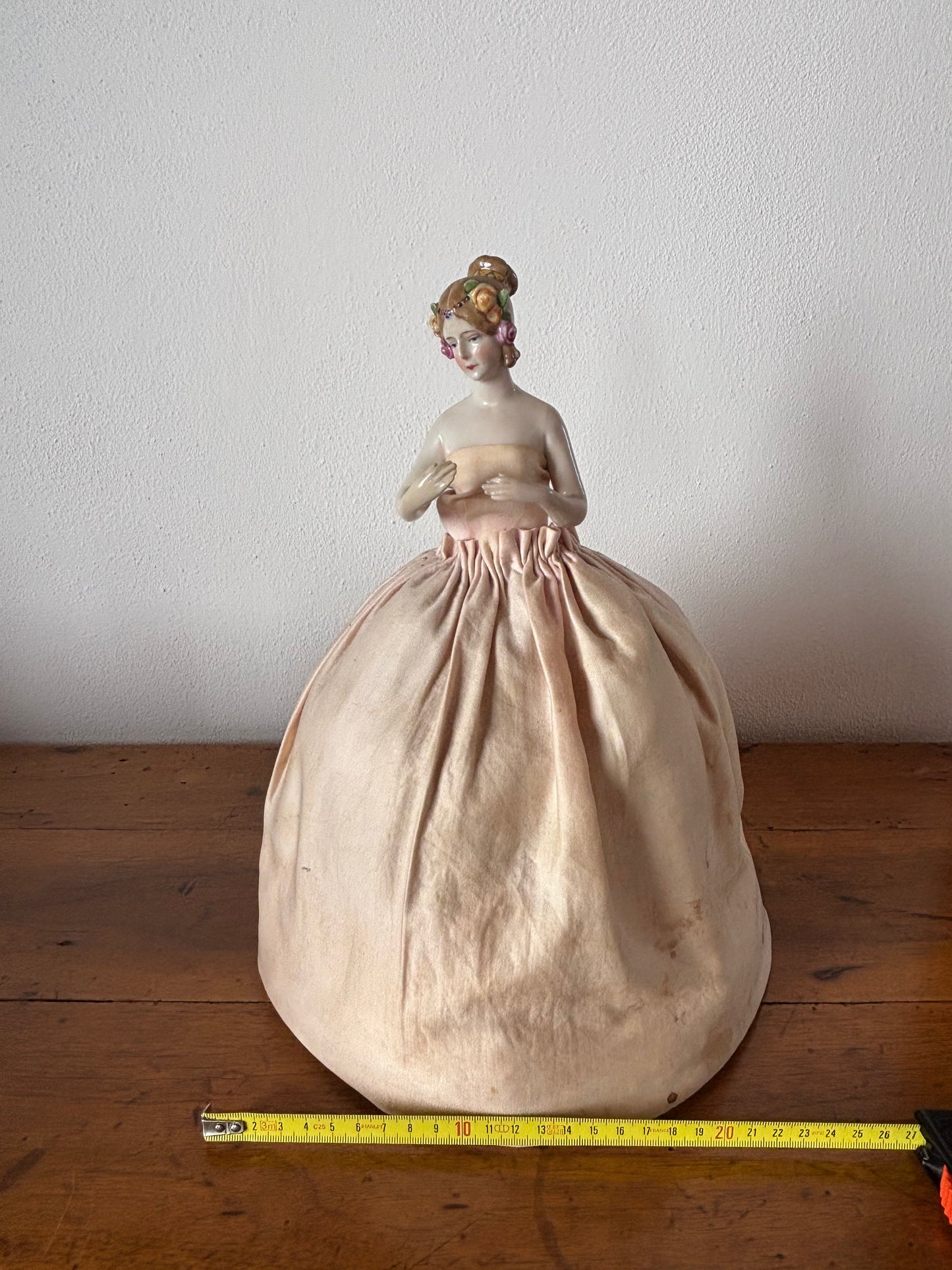 Vintage half porcelain doll with padded fabric skirt