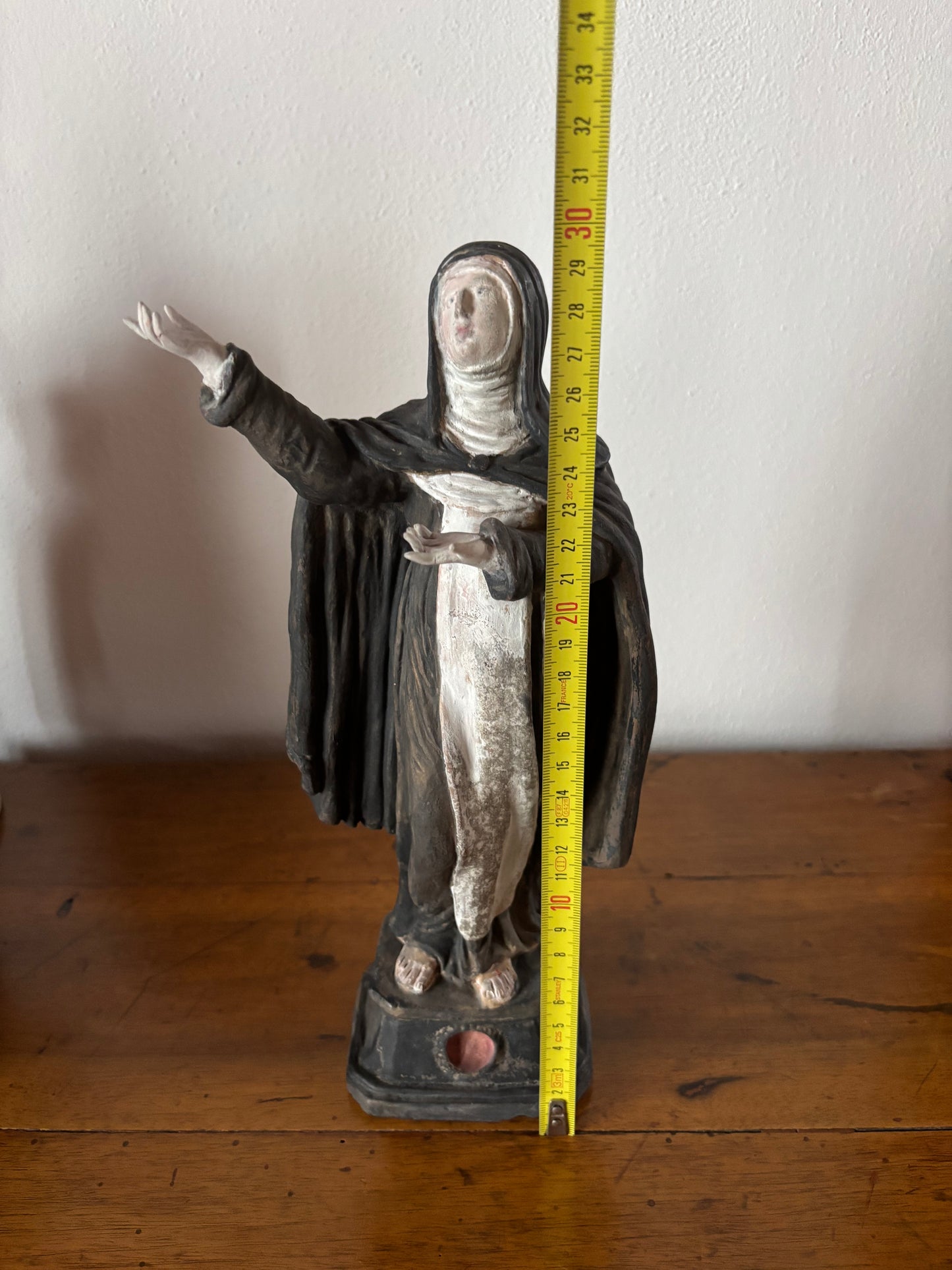 Statua antica in terracotta