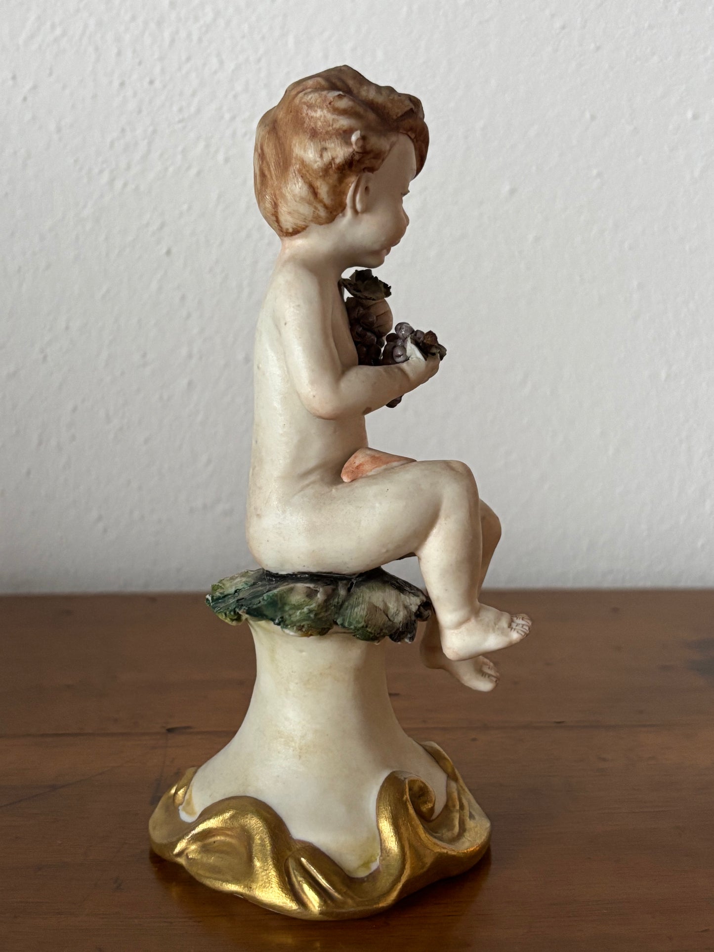 Cherub Figurine with Grapes