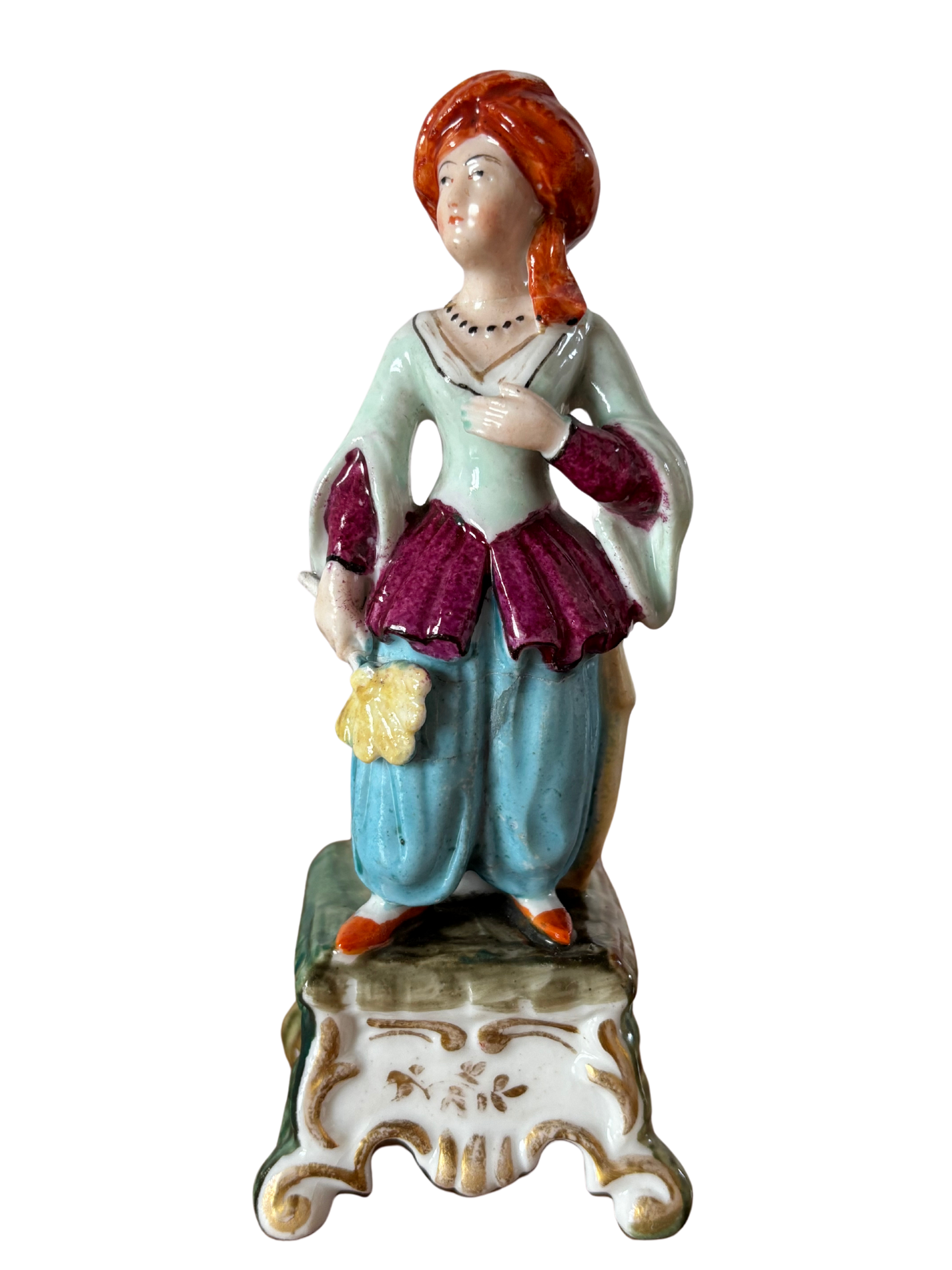 Antique inkstand with a figurine of a woman in 18th-century attire