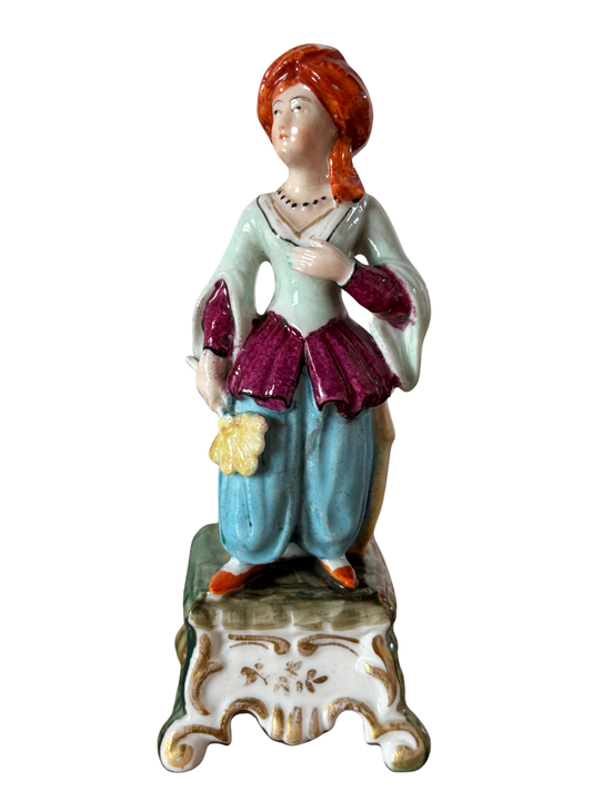 Antico calamaio con figurina di donna in abiti settecenteschi