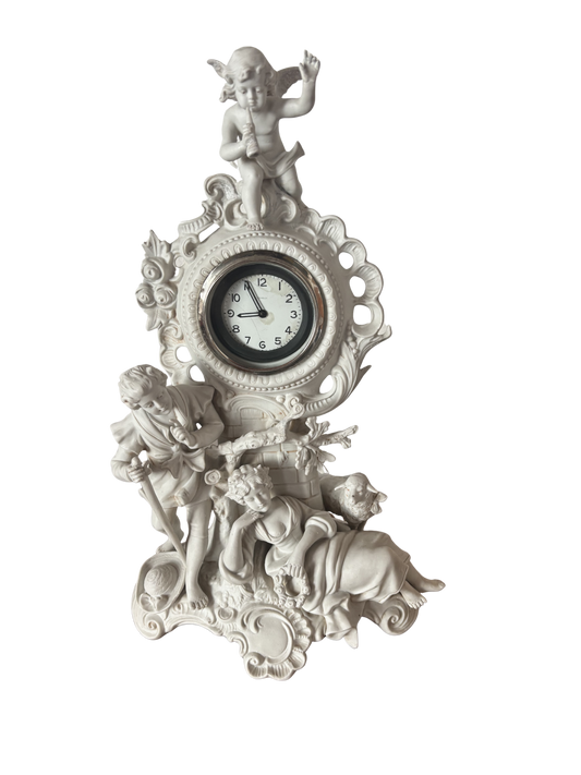 Orologio vintage in ceramica bianca finemente decorata