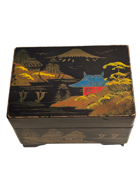 Kleine Vintage‑Spieluhr mit Ballerina und goldener Dekoration