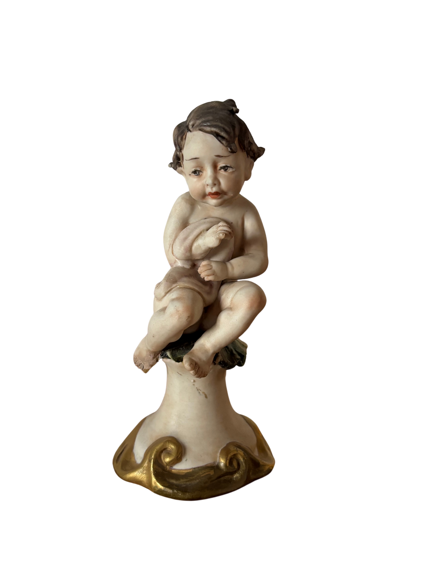 Statuetta di putto con coperta