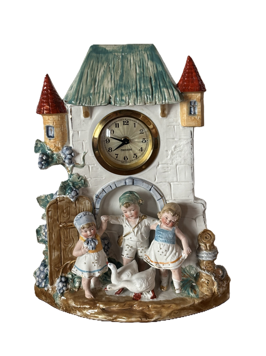Orologio in ceramica decorativa Made in Germany – scena campestre con bambini e oche