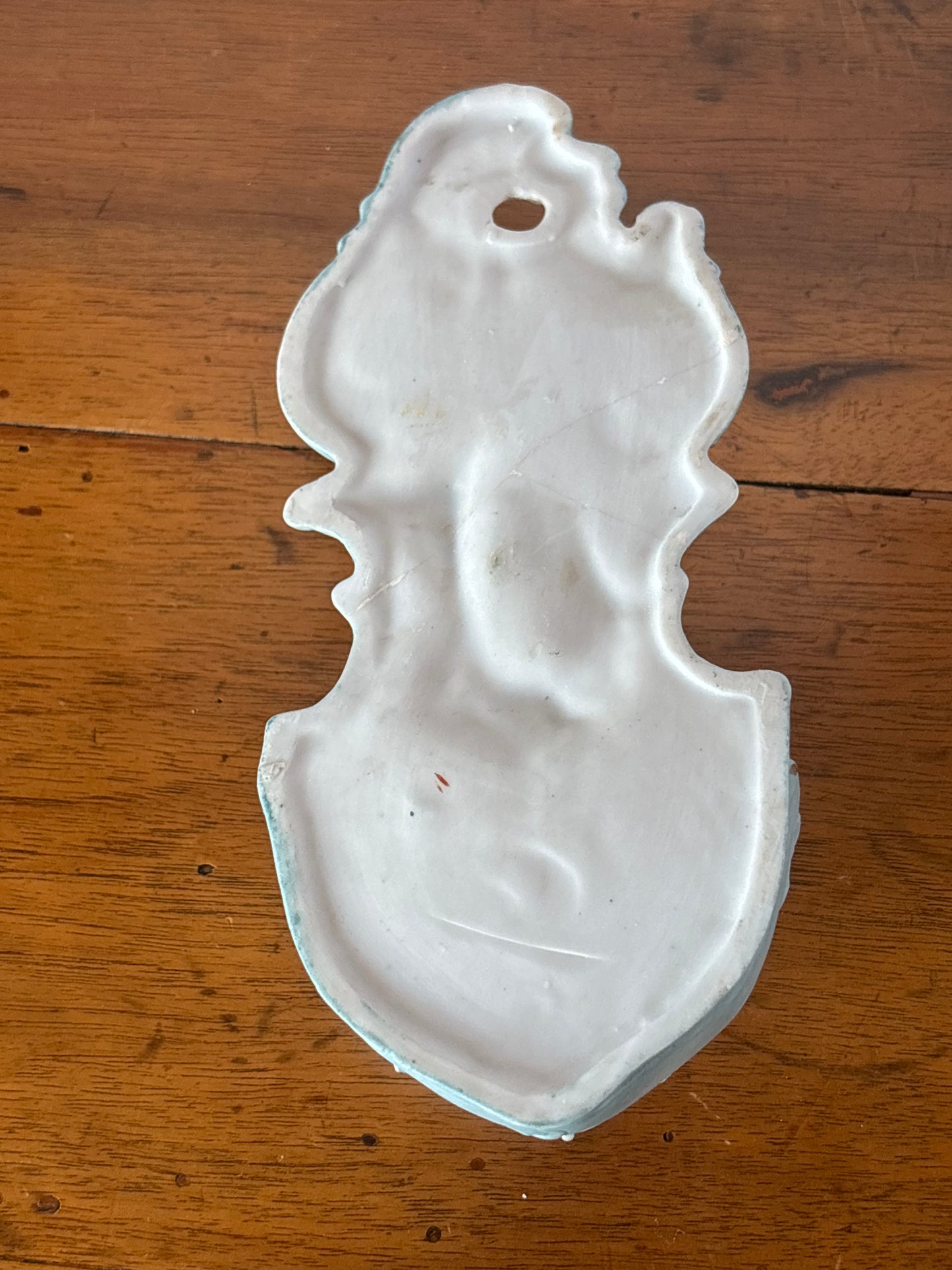 Acquasantiera in ceramica bisquit blu con angelo dorato