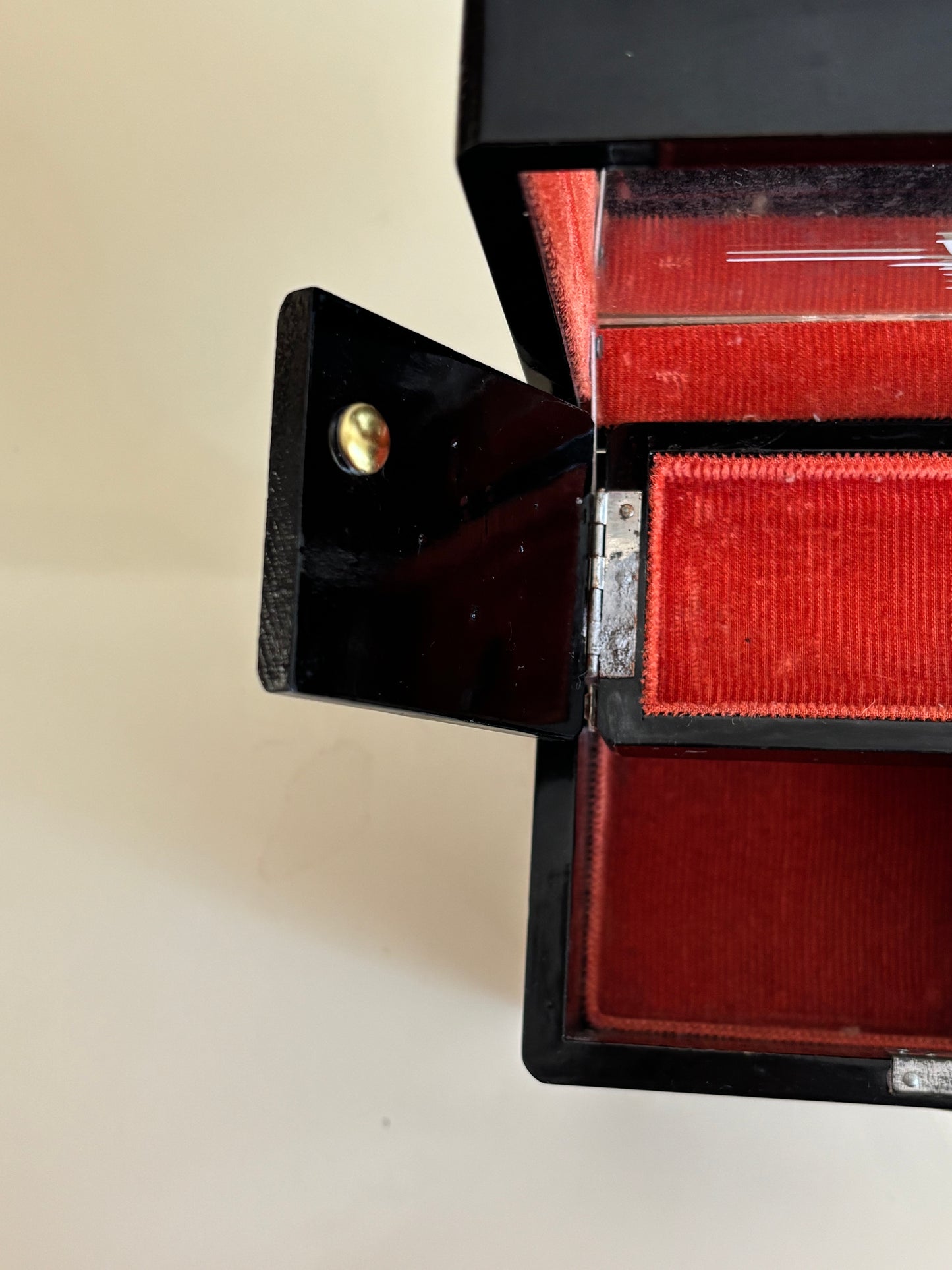 Small vintage music box with key, lacquered case and Mount Fuji on the mirror