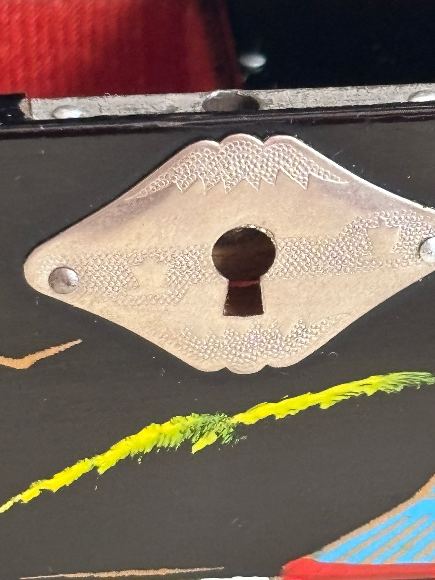 Small vintage music box with key, lacquered case and Mount Fuji on the mirror