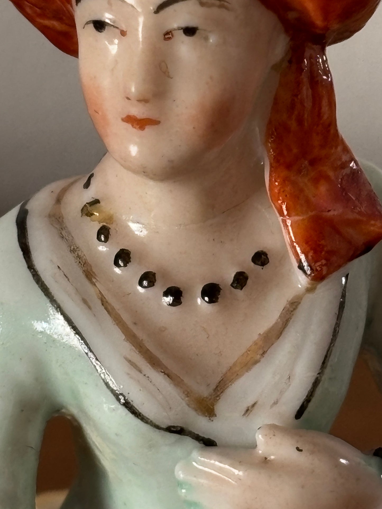 Antique inkstand with a figurine of a woman in 18th-century attire