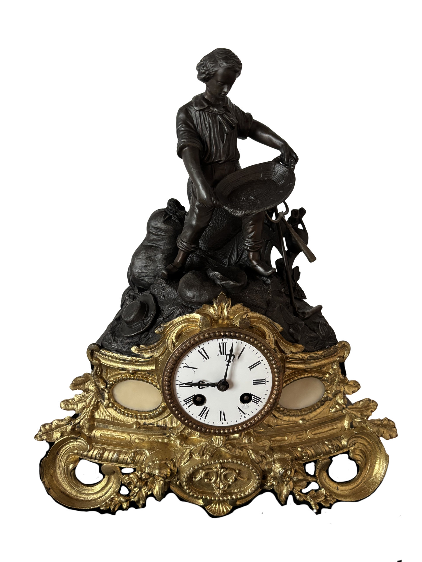 Orologio da camino antico con giovane cercatore d’oro